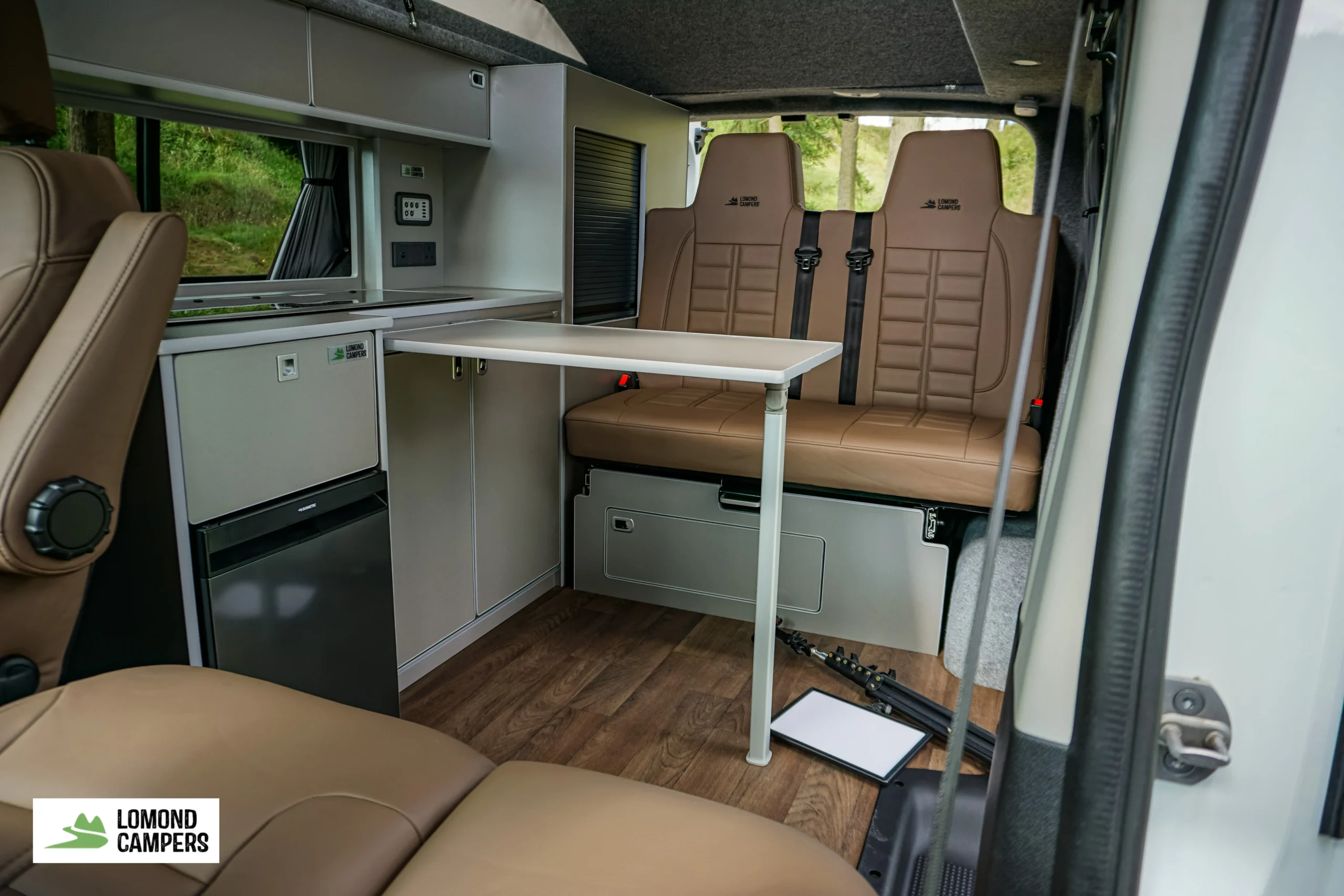 Renault Trafic Campervan Conversion in Scenic Photoshoot Interior Table and Rear seats by Lomond Campers